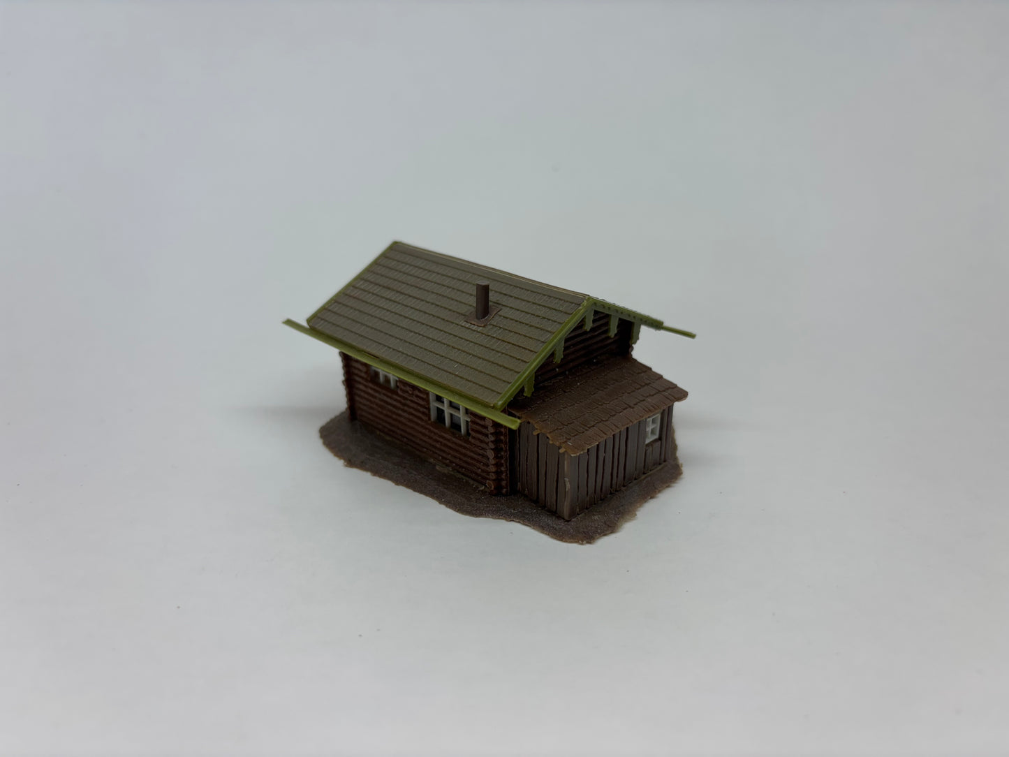 HO Scale Log Cabin with Figure – Scenic Structure